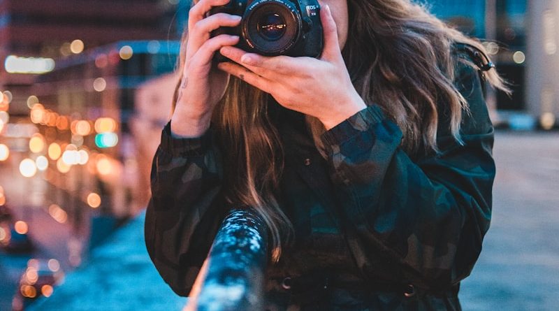 woman using camera