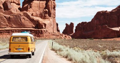 yellow Volkswagen van on road