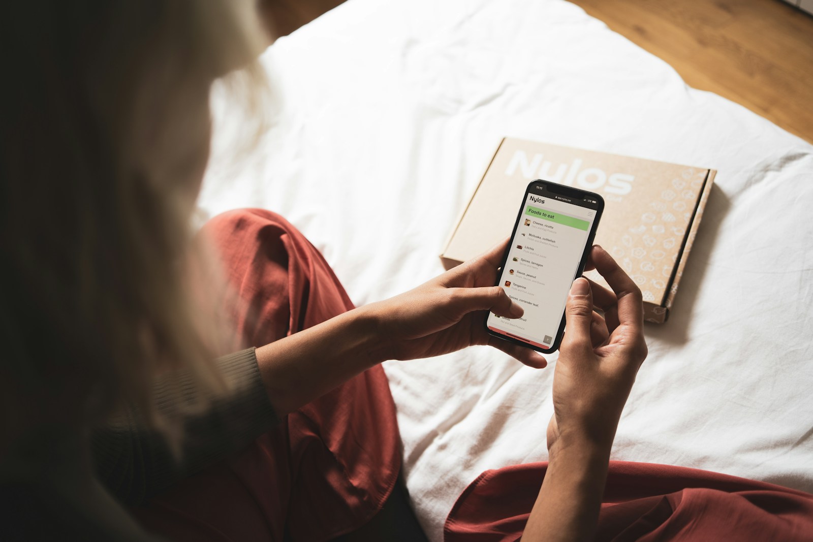 person holding white android smartphone