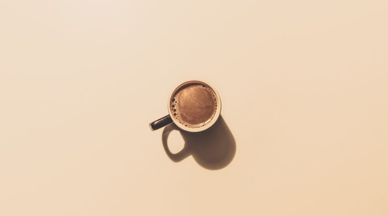 brown ceramic teacup