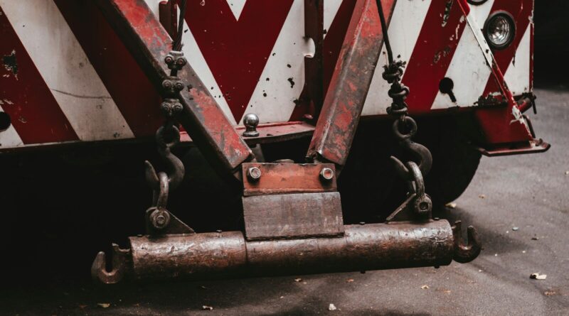 gray and red vehicle on gray surface
