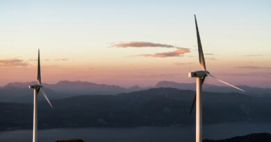 two white wind turbines