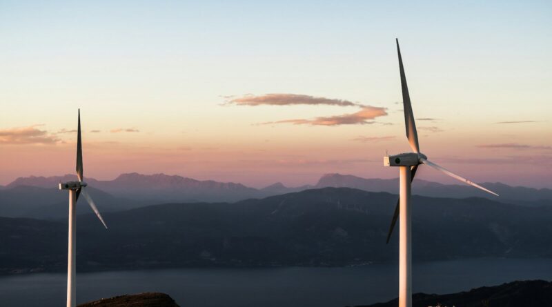 two white wind turbines