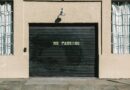 black metal roll-up door with no parking print